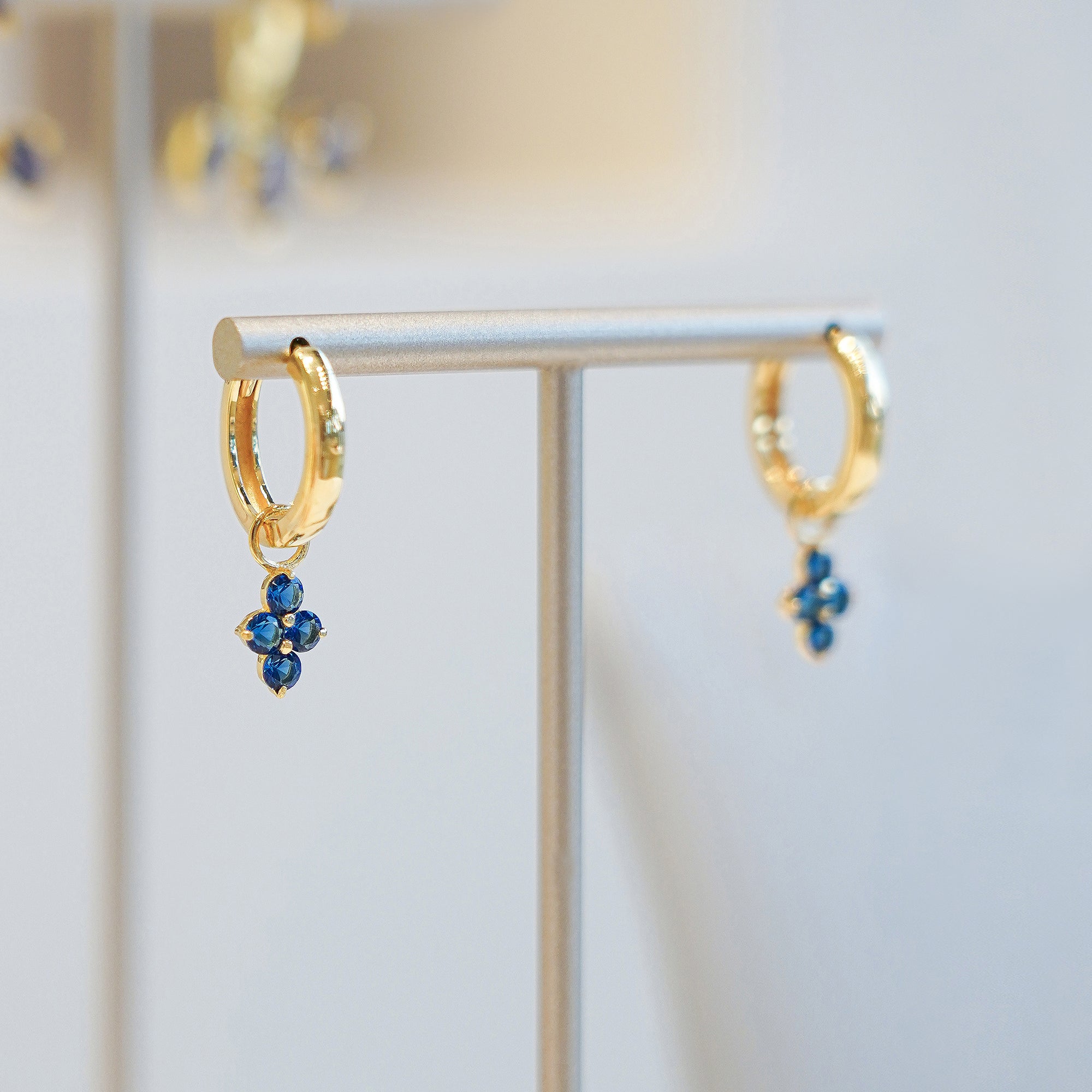 Ibu Huggies Earrings With Blue Sapphire Charms - Sterling Silver | BITS OF BALI JEWELRY