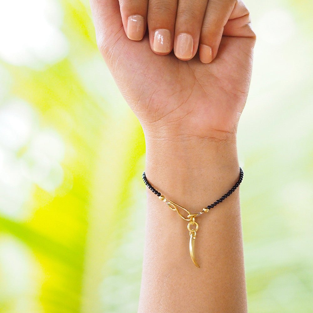 Nirmala Tiny Bead Bracelet With Frangipani - Black Onyx | BITS OF BALI JEWELRY